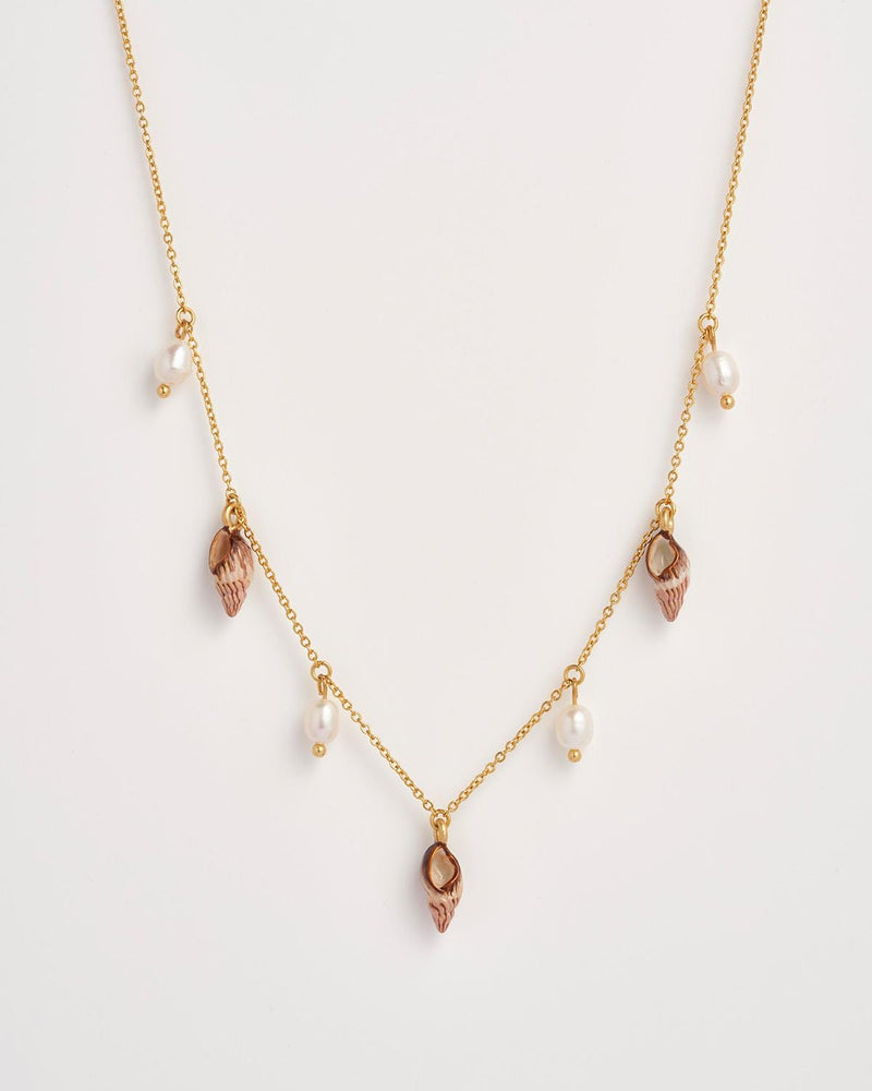 Spiral Shell Charm & Pearl Worn Gold Necklace by Fable England