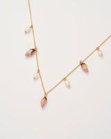 Spiral Shell Charm & Pearl Worn Gold Necklace by Fable England